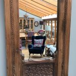 blue-chair-through-teak-doorframe-mirror-Home at the Heart