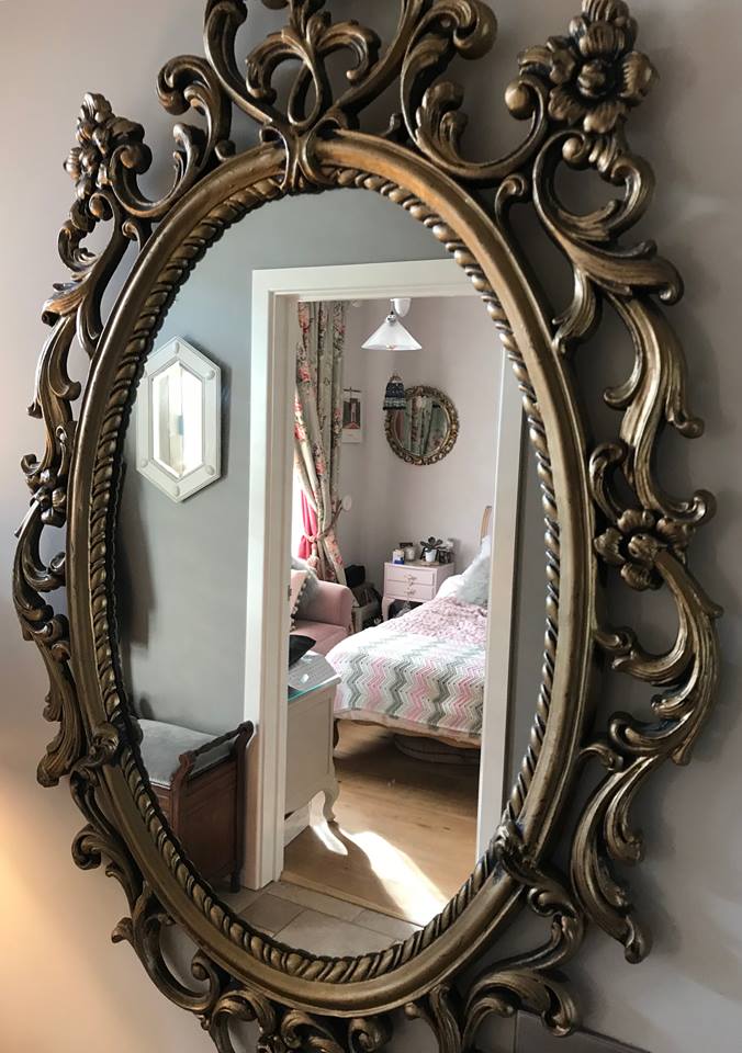 entarance-hall-ornate-oval-gilt-mirror-home-at-the-heart